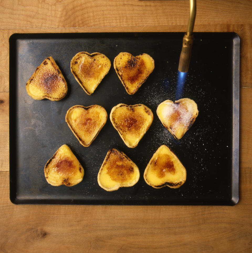 Heart-shaped little creme brûlées are sure to get your pulse racing in New Caledonia. Delicious. Photo: Getty