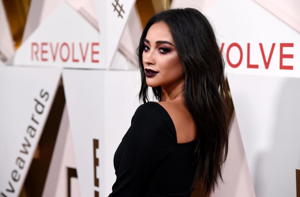 Shay Mitchell poses at the 2017 Revolve Awards on Thursday, Nov. 2, 2017, in Los Angeles.