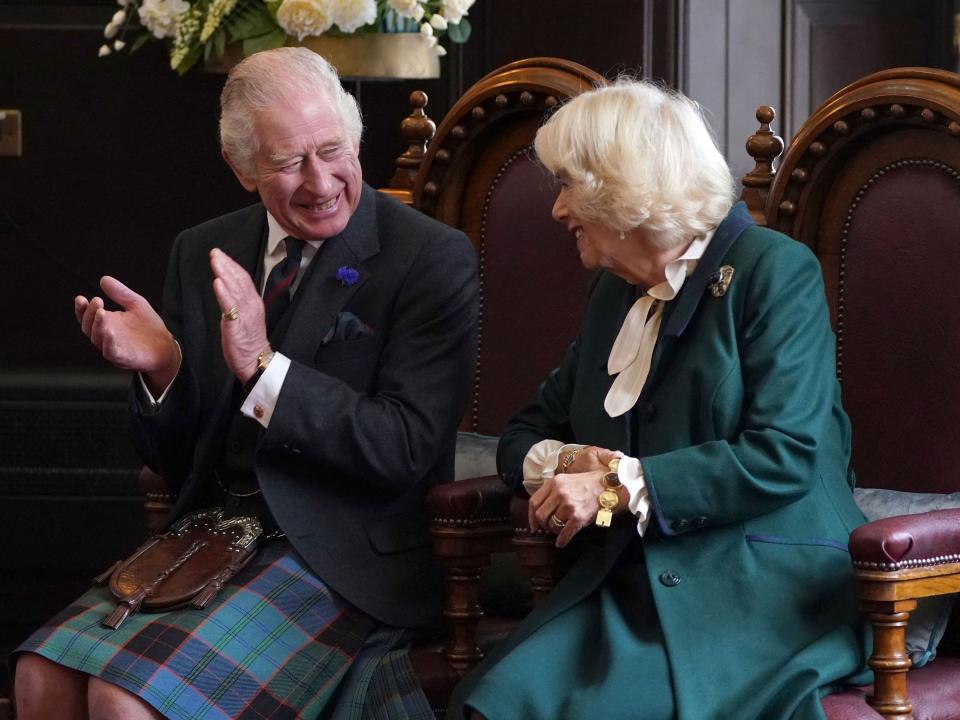 King Charles III and Britain's Camilla, Queen Consort attend an official council meeting in Dunfermline on October 3, 2022.