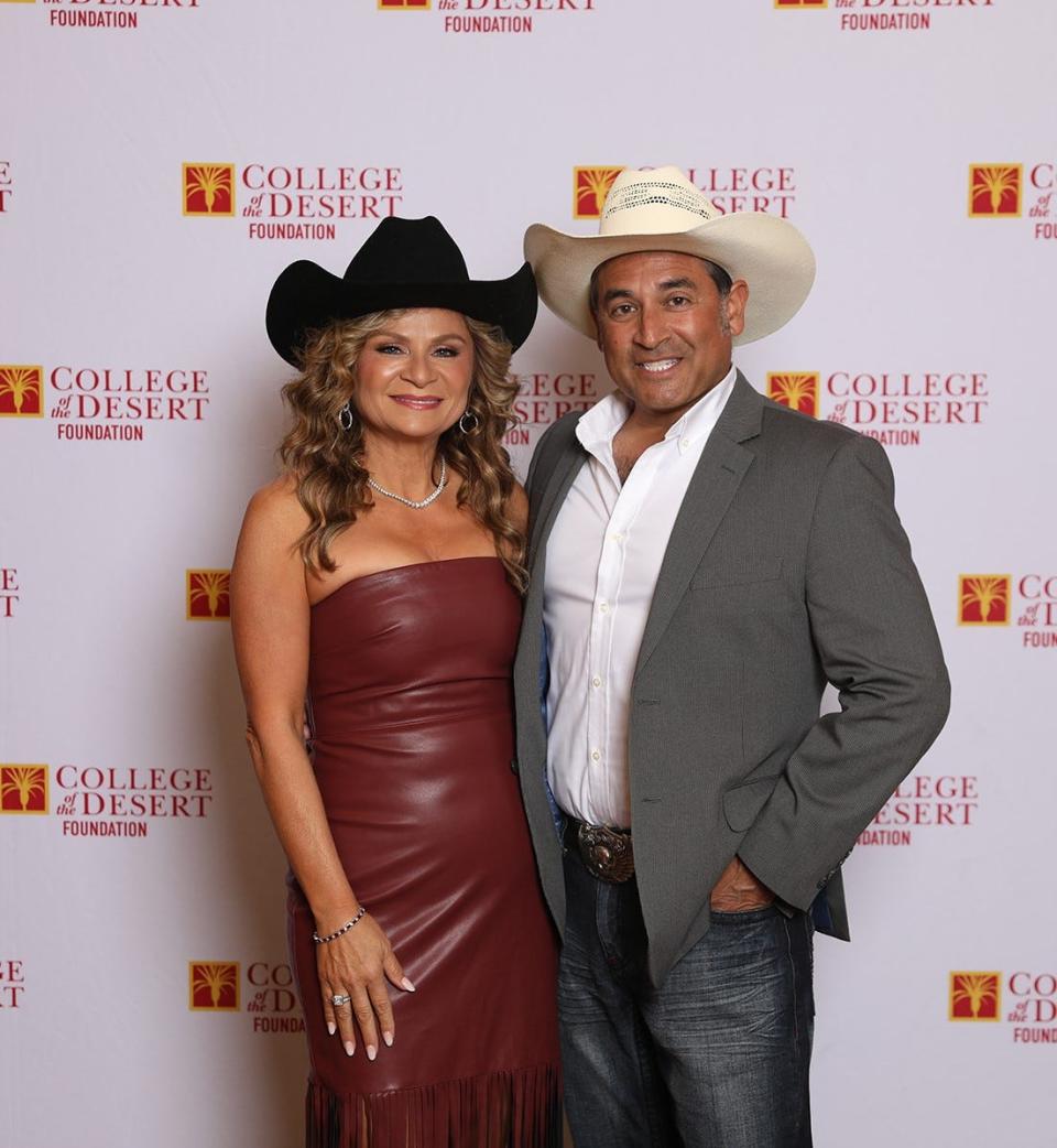 Event co-chair Norma Castaneda and Sergio Rodriquez show off their country western looks at Stepping Out for College of the Desert 2024, held April 4, 2024.