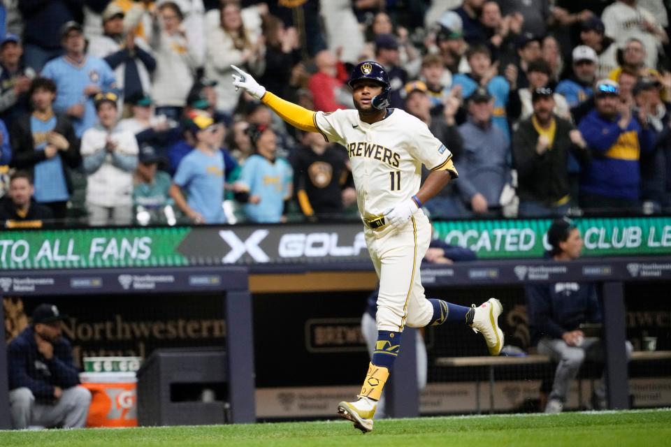 Jackson Chourio celebrates a home run against the Mariners on Saturday night. The Reds and Brewers, who won 15 of the 19 games the teams played last season, begin at four-game series at Great American Ball Park on Monday night.