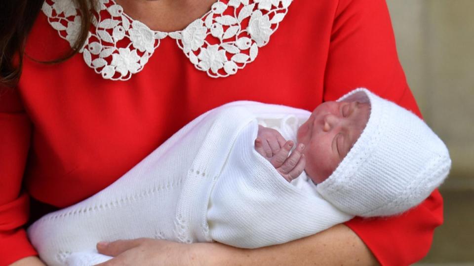 The Duke and Duchess of Cambridge hold newborn baby Prince Louis outside the Lindo Wing (PA)