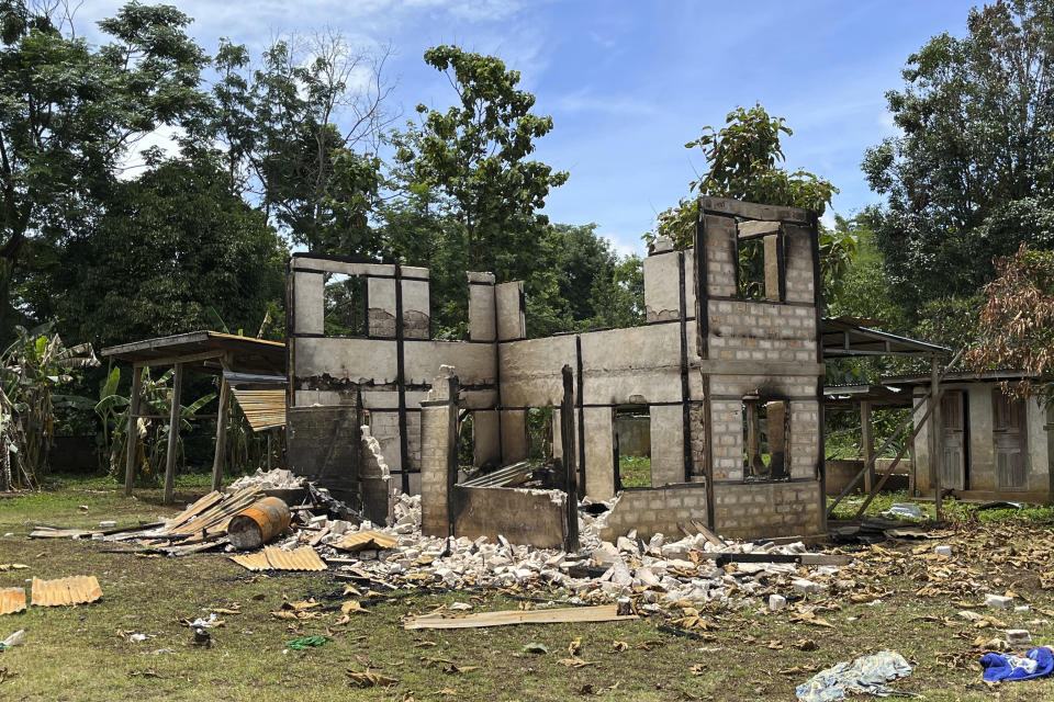 This photo taken in June/July 2022 and provided by Amnesty International shows a ruined home in Daw Ngay Khu village in Kayah state, eastern Myanmar. Myanmar’s military has laid landmines that have killed and injured people in and around villages in Kayah, a conflict-affected region near the border with Thailand, Amnesty International said Wednesday, July 20, 2022. (Amnesty International via AP)
