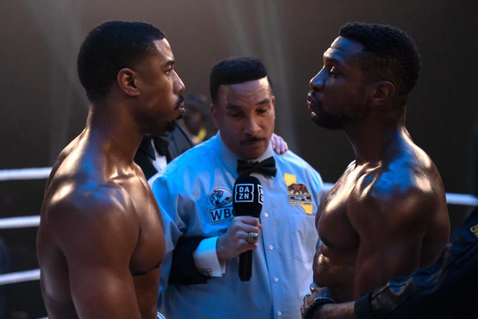 Adonis Creed (Michael B. Jordan, left) faces his old friend Damian Anderson (Jonathan Majors) in the ring in the boxing drama "Creed III."