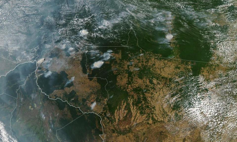 A Nasa images shows several fires burning in Brazilian states