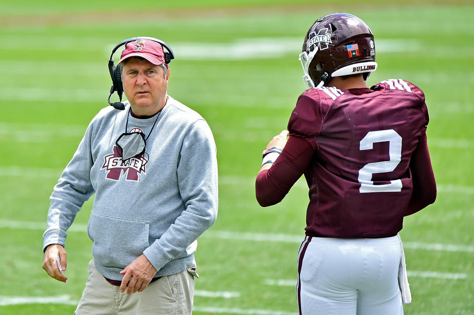 STARKVILLE, MISSISSIPPI - APRIL 17: Head coach Mike Leach of the Mississippi State Bulldogs and quarterback Will Rogers #2 speak during the first half of the Maroon and White spring game at Davis Wade Stadium on April 17, 2021 in Starkville, Mississippi. (Photo by Justin Ford/Getty Images)