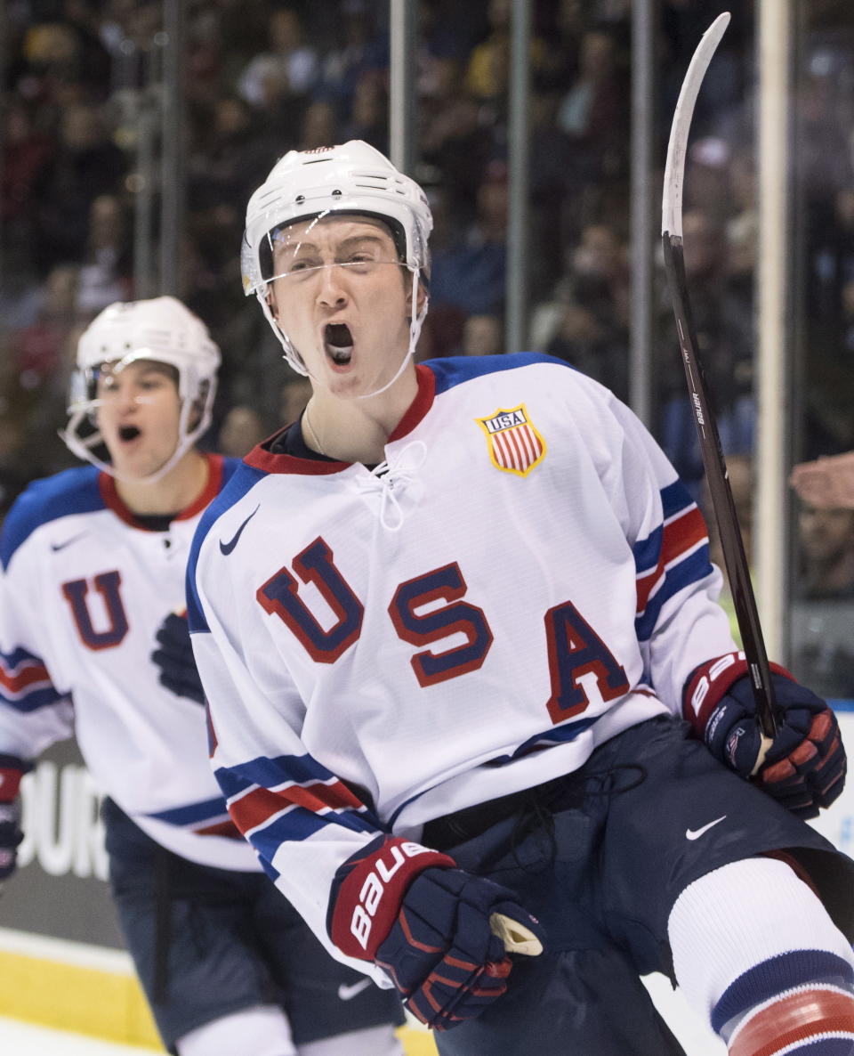 United States Tyler Madden (9) celebrates his goal against Finland during the second period of a world junior hockey championships game in Victoria, British Columbia, Monday, Dec. 31, 2018. (Jonathan Hayward/The Canadian Press via AP)
