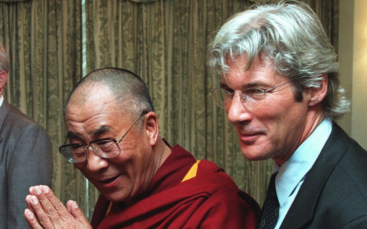 Richard Gere with the Dalai Lama in 1999 - AP