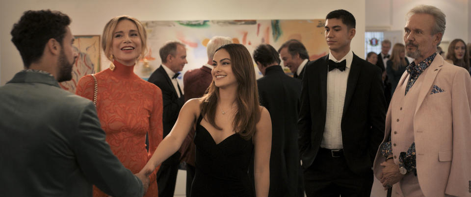 (L - R): Catherine (Lena Olin), Ana (Camila Mendes), William (Archie Renaux), Julian (Anthony Head) in UPGRADED.