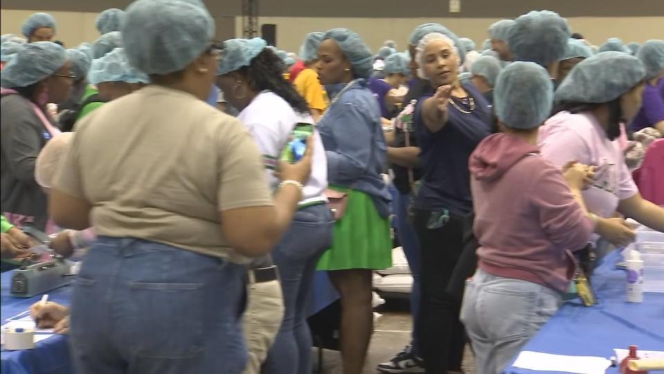 Many families honored Dr. Martin Luther King Jr. by helping others at the Orange County Convention Center.