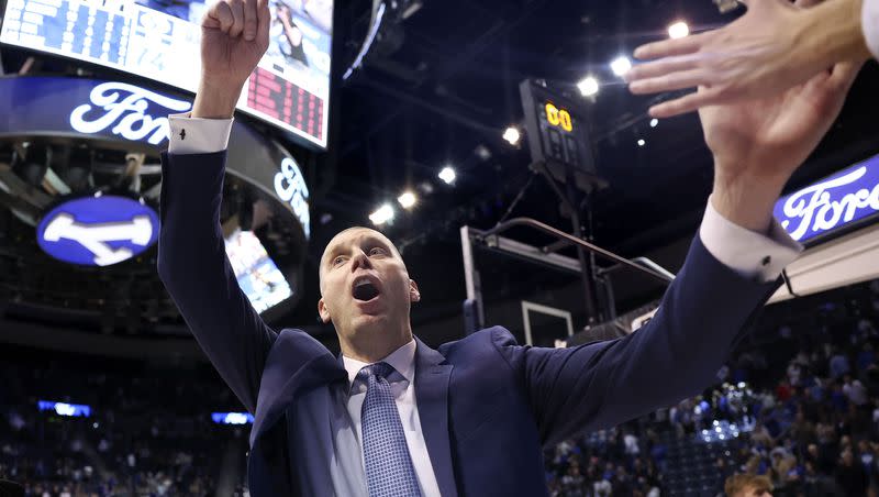 BYU basketball coach Mark Pope celebrates with fans after BYU’s win against San Diego State at the Marriott Center in Provo on Friday, Nov. 10, 2023. Next up for the No. 19 Cougars is a contest against Fresno State Friday at the Delta Center in Salt Lake City.