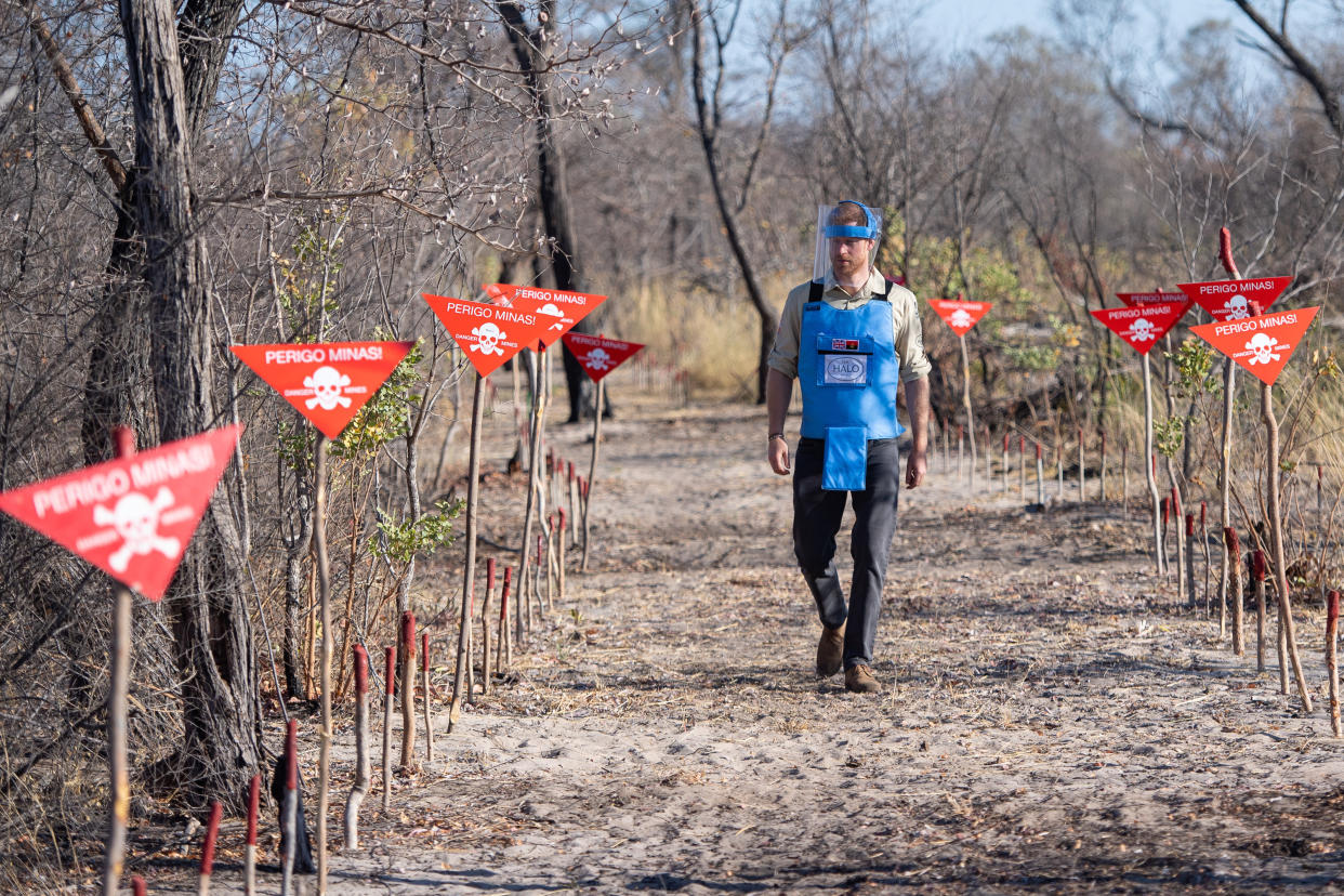 The Duke of Sussex walks through a minefield in Dirico, Angola, during a visit to see the work of landmine clearance charity the Halo Trust, on day five of the royal tour of Africa.  [Photo: PA]