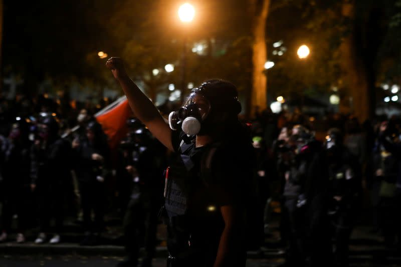 A protester chants during a rally against police violence and racial inequality in Portland