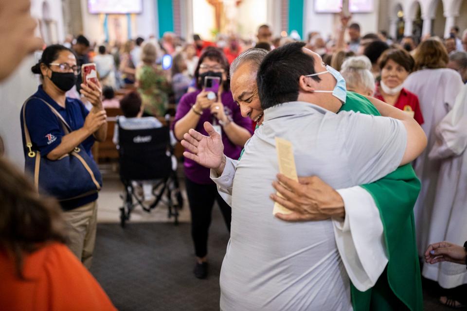 Bañuelas says goodbye to a parishioner at Saint Mark’s Catholic Church, in El Paso, Texas, Sunday, July 10, 2022.