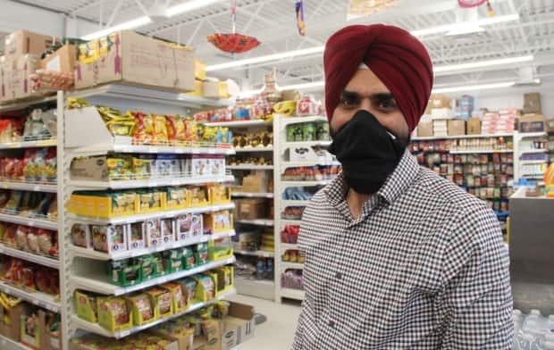 Jagjit Gill, owner of Gill's Supermarket, said his Keewatin Street store saw decreased business for three months after a false rumour that several of his employees had COVID-19. 