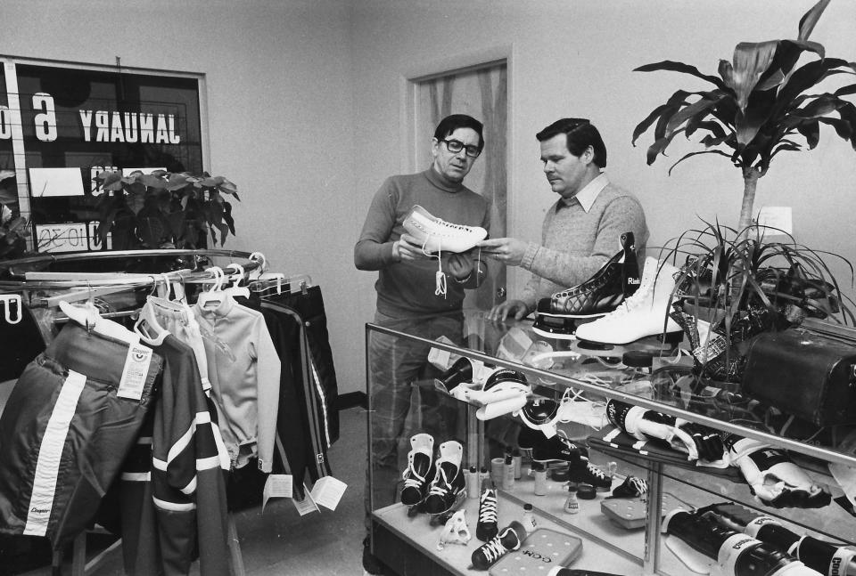 Co-owners Lou Mikula and Dan Richards discuss the sport shop at Lomi Ice Haus in January 1978.