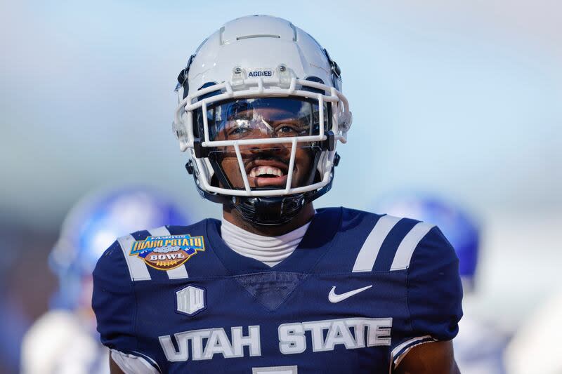 Utah State wide receiver Jalen Royals celebrates after a 35-yard touchdown reception against Georgia State in the Famous Idaho Potato Bowl Saturday, Dec. 23, 2023, in Boise, Idaho. | Steve Conner, Associated Press