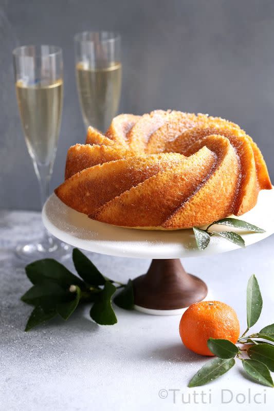 <p>Tutti Dolci</p><p>This light and lovely citrus champagne bundt cake is perfumed with winter citrus and is the perfect celebratory bundt cake!</p><p><strong>Get the recipe: <a href="https://tutti-dolci.com/citrus-champagne-bundt-cake/" rel="nofollow noopener" target="_blank" data-ylk="slk:Citrus Champagne Bundt Cake;elm:context_link;itc:0;sec:content-canvas" class="link ">Citrus Champagne Bundt Cake</a></strong></p>