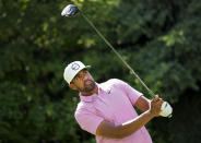 Tony Finau, of the United States, watches his tee shot on the 17th hole during round three of the Canadian Open golf tournament at St. George's Golf and Country Club in Toronto, Saturday, June 11, 2022. (Nathan Denette/The Canadian Press via AP)