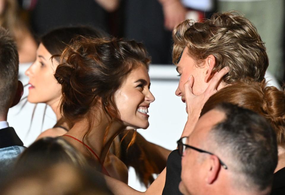 cannes, france   may 25  kaia gerber and austin butler depart the screening of elvis during the 75th annual cannes film festival at palais des festivals on may 25, 2022 in cannes, france photo by stephane cardinale   corbiscorbis via getty images