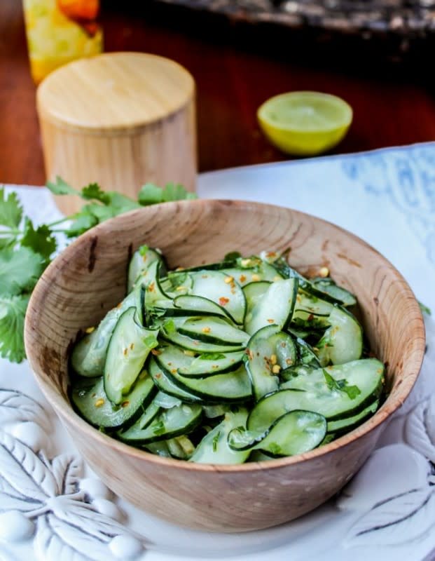 <p>The Food Charlatan</p><p>This fast-and-fresh cucumber salad has a bit of kick!</p><p><a href="http://thefoodcharlatan.com/2014/01/06/cilantro-lime-cucumber-salad/" rel="nofollow noopener" target="_blank" data-ylk="slk:Get the recipe!;elm:context_link;itc:0;sec:content-canvas" class="link ">Get the recipe!</a></p>