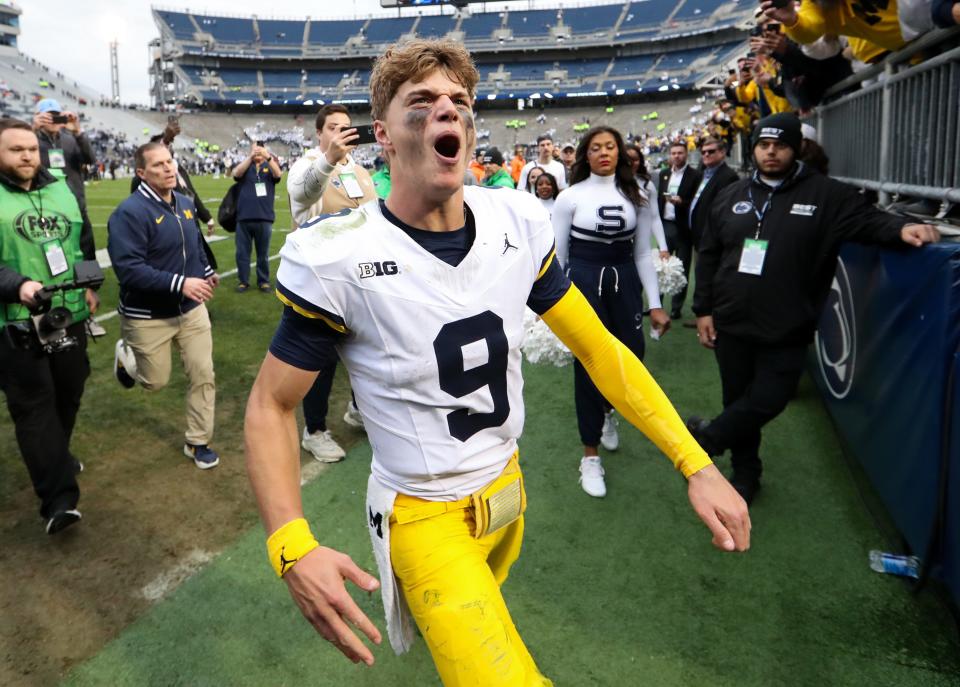 Michigan Wolverines quarterback J.J. McCarthy (9) reacts while leaving the field following a game against the Penn State Nittany Lions at Beaver Stadium.