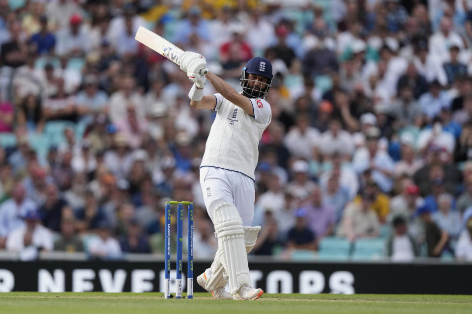 England's Moeen Ali plays a shot on day three of the fifth Ashes Test match between England and Australia, at The Oval cricket ground in London, Saturday, July 29, 2023. (AP Photo/Kirsty Wigglesworth)