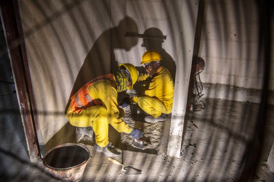 Construction workers in Lusail City switch to cool indoor work when the temperature rises.<span class="copyright">Ed Kashi—VII for TIME</span>