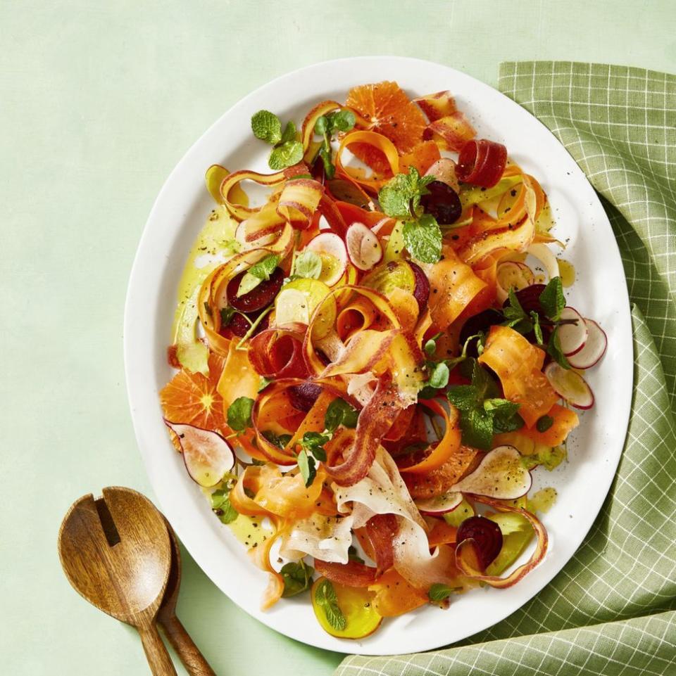 <p>The citrusy vinaigrette seeps into the crunchy salad as it sits, making this a great make-ahead option.</p><p>Get the <a href="https://www.goodhousekeeping.com/food-recipes/healthy/a30729726/shaved-carrot-salad-recipe/" rel="nofollow noopener" target="_blank" data-ylk="slk:Shaved Carrot and Radish Salad recipe;elm:context_link;itc:0;sec:content-canvas" class="link "><strong>Shaved Carrot and Radish Salad recipe</strong></a>.</p>