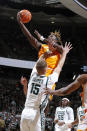 Tennessee's Jahmai Mashack, top, goes up to shoot against Michigan State's Carson Cooper (15) during the first half of an NCAA college basketball exhibition game, Sunday, Oct. 29, 2023, in East Lansing, Mich. Mashack was called for a charge. (AP Photo/Al Goldis)