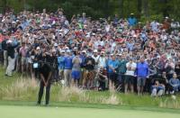 May 17, 2019; Bethpage, NY, USA; Tiger Woods putts on the sixth green during the second round of the PGA Championship golf tournament at Bethpage State Park - Black Course. Mandatory Credit: Brad Penner-USA TODAY Sports