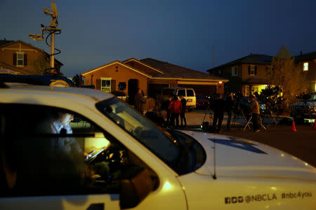 News crews gather outside the home of David Allen and Louise Anna Turpin in Perris, California, U.S., January 15, 2018. REUTERS/Mike Blake