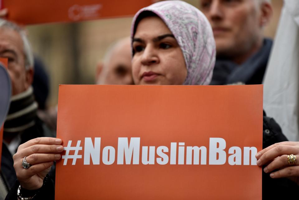 A woman holds banner, reading '#NoMuslimBan' during a protest against President Donald Trump and his policies outside the U.S. Embassy in Rome, Italy on Feb.&nbsp;2, 2017.