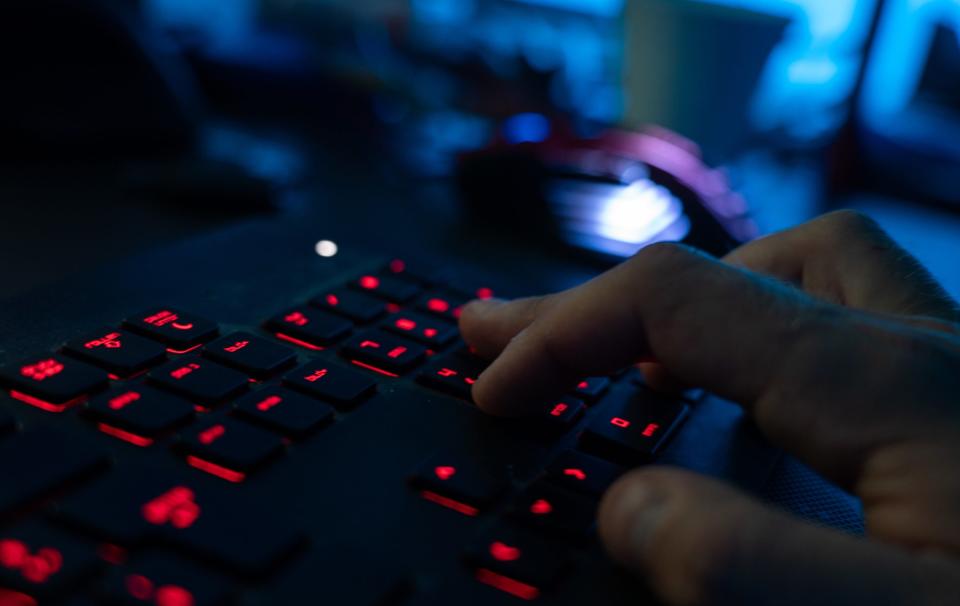 29 April 2020, Bavaria, Ebing: ILLUSTRATION - A man sits at a computer and types on a keyboard. Photo: Nicolas Armer/dpa (Photo by Nicolas Armer/picture alliance via Getty Images)