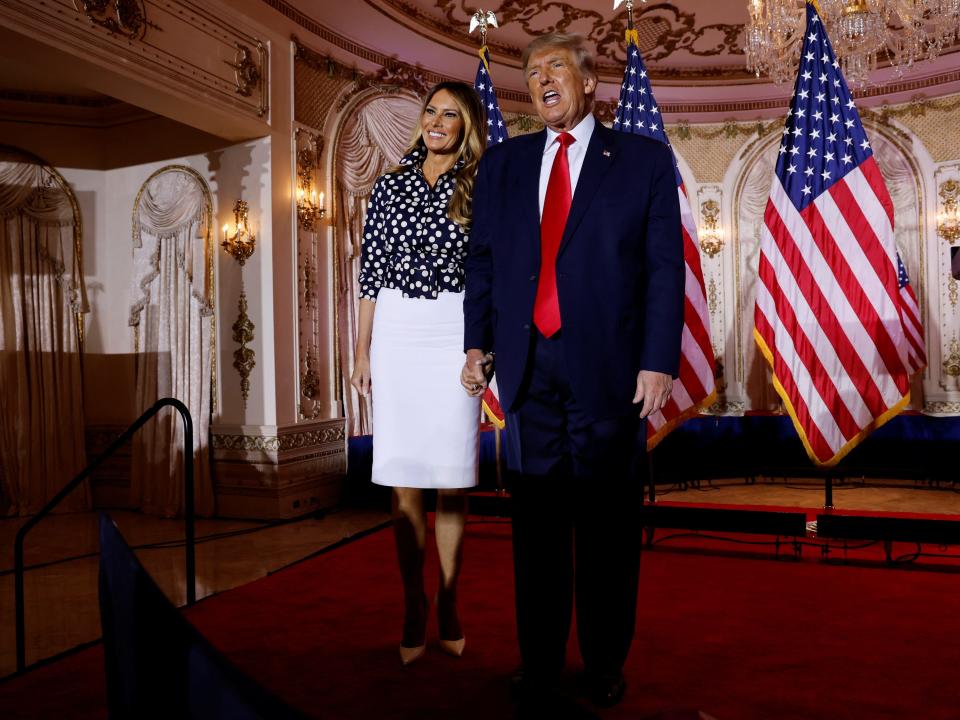 Former U.S. first lady Melania Trump and former U.S. President Donald Trump stand onstage together after Trump announced that he would once again run for U.S. president in the 2024 U.S. presidential election during an event at his Mar-a-Lago estate in Palm Beach, Florida, U.S. November 15, 2022.
