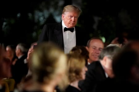 U.S. President Donald Trump greats guests during a state dinner for Australia’s Prime Minister Scott Morrison in the Rose Garden of the White House in Washington