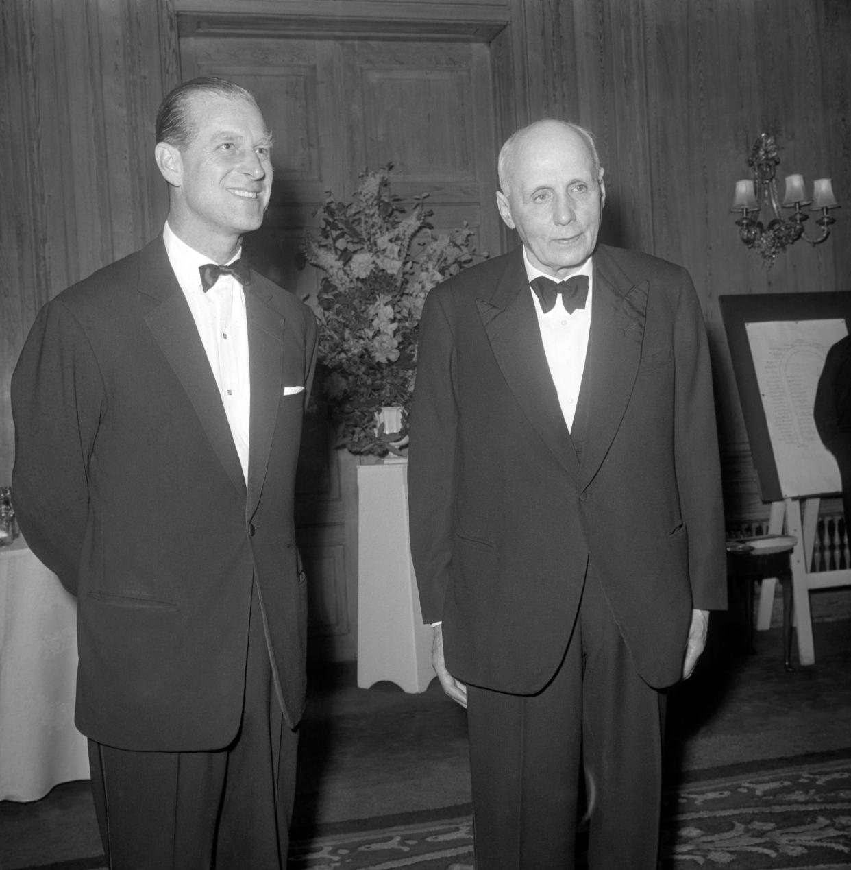 Prince Philip, The Duke of Edinburgh, ex pupil of Gordonstoun, meets his old headmaster, Dr. Kurt Hahn, at a dinner given in the doctor's honour by The Friends of Gordonstoun. Dr. Hahn, who is 77, founded Salem School in Germany and the Duke studied there for a year. When Dr. Hahn moved the school to Scotland, the Duke went with it. Dr. Hahn retired in 1953   (Photo by PA Images via Getty Images)