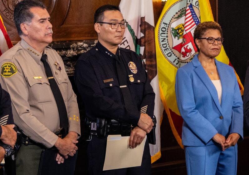 Aug. 2023 photo of (from left) LA County Sheriff Robert Luna, Assistant Chief LAPD Dominic Choi, and L.A. Mayor Karen Bass.