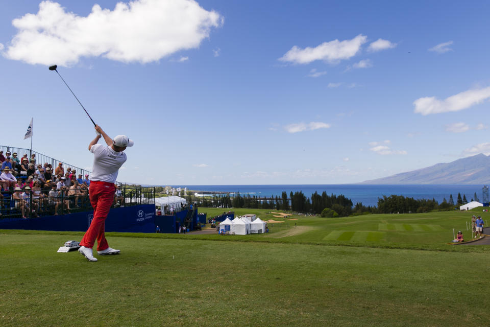 Webb Simpson drives on the first tee during the third round of the Tournament of Champions golf tournament, Sunday, Jan. 5, 2014, in Kapalua, Hawaii. (AP Photo/Marco Garcia)