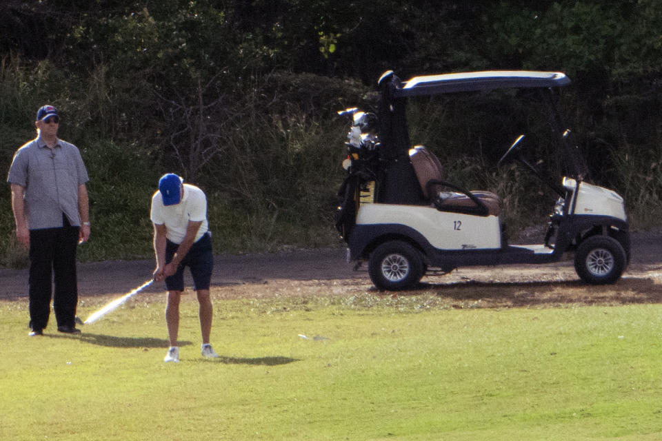 President Joe Biden plays golf at The Buccaneer in Christiansted, U.S. Virgin Islands, Friday, Dec. 30, 2022. (AP Photo/Manuel Balce Ceneta)