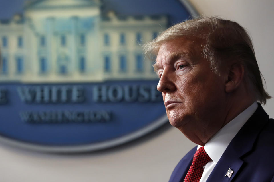 President Donald Trump listens as Dr. Deborah Birx, White House coronavirus response coordinator,speaks about the coronavirus in the James Brady Press Briefing Room of the White House, Thursday, April 16, 2020, in Washington. (AP Photo/Alex Brandon)