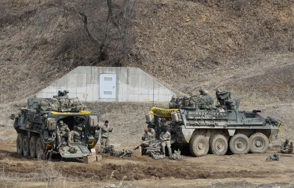 U.S. Army soldiers prepare for their exercise at a training field in Paju, South Korea, near the border with North Korea, Friday, March 17, 2023. North Korea said Friday it fired an intercontinental ballistic missile to "strike fear into the enemies" as South Korea and Japan agreed at a summit to work closely on regional security with the United States and staged military exercises around the region.(AP Photo/Ahn Young-joon)