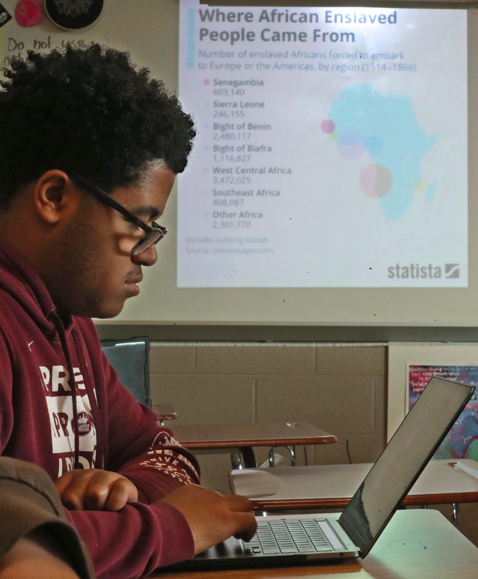 Parson Jordan watches a video on his computer during the AP African American Studies course at Firestone CLC.