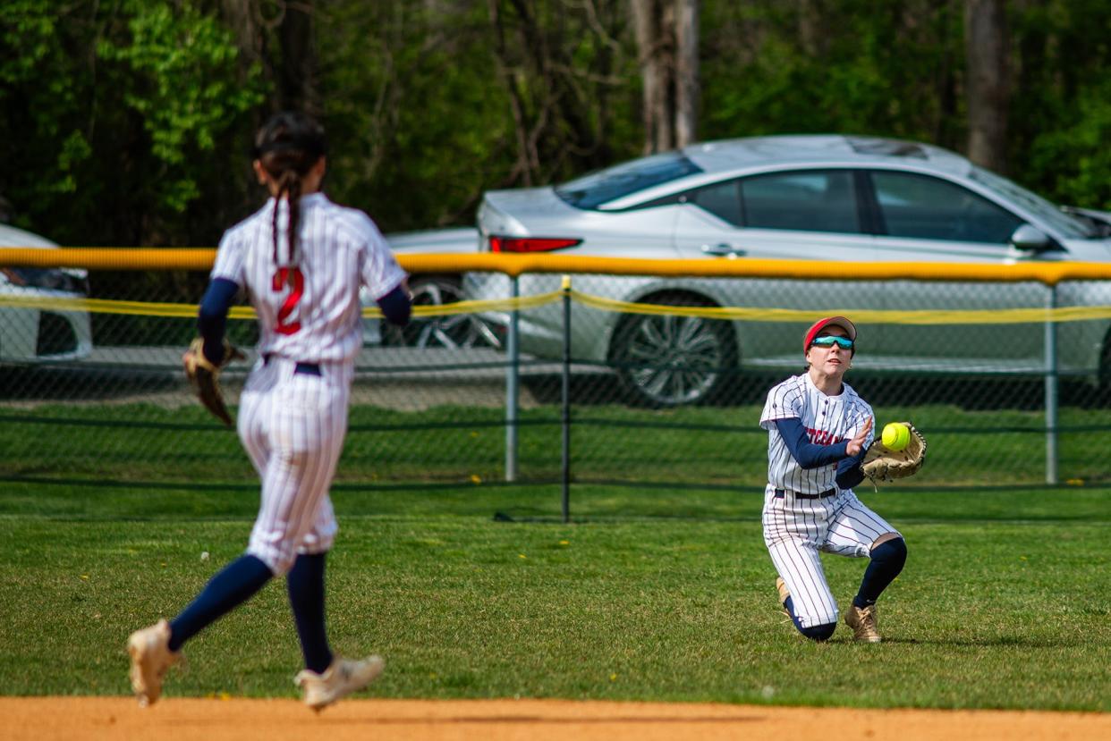 Ketcham's Claire Moore, right, catches a fly ball in the outfield during the Bisaccia Softball Tournament in Wappingers Falls, NY on Saturday, April 27, 2024.