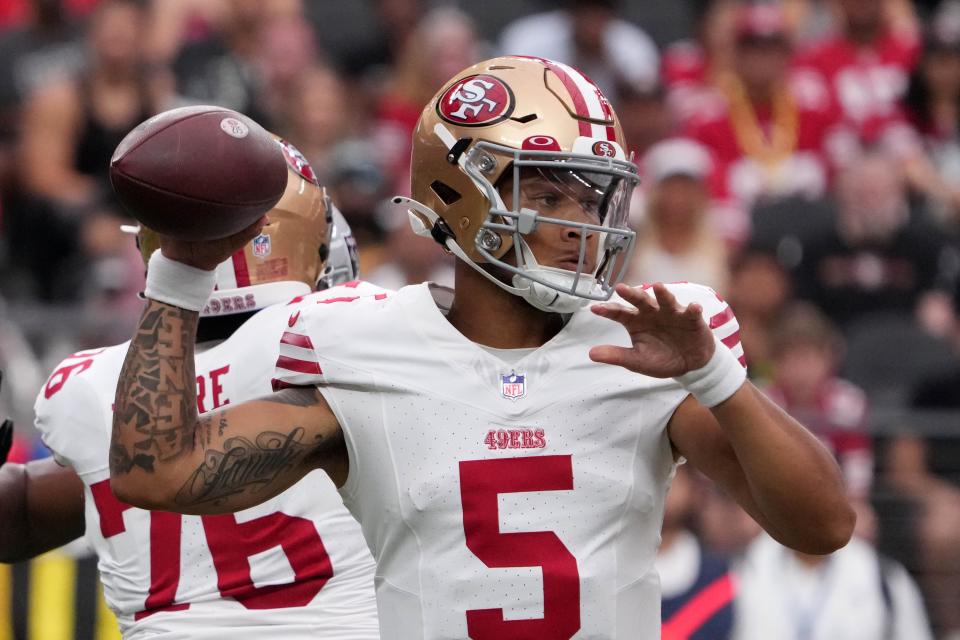 Trey Lance looks to pass during a preseason game against the Raiders.