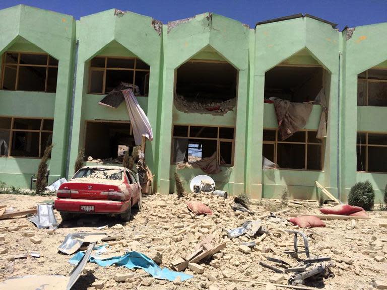 The aftermath of a suicide bomb blast at a government complex in Zabul on May 25, 2015