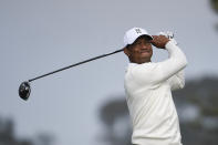 Tiger Woods hits his tee shot on the fifth hole of the South Course at Torrey Pines Golf Course during the second round of the Farmers Insurance golf tournament Friday Jan. 24, 2020, in San Diego. (AP Photo/Denis Poroy)