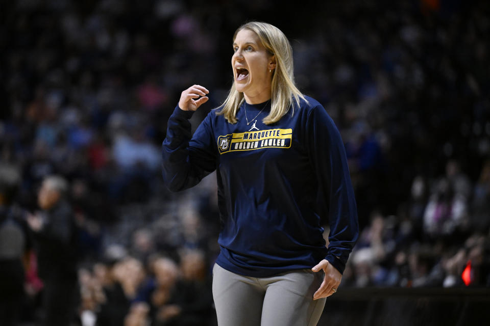 Marquette head coach Megan Duffy calls to her team during the first half of an NCAA college basketball game against UConn in the semifinals of the Big East Conference tournament at Mohegan Sun Arena, Sunday, March 10, 2024, in Uncasville, Conn. (AP Photo/Jessica Hill)