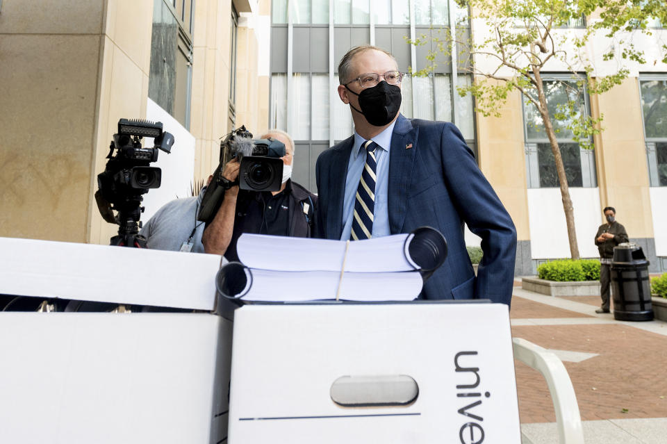 Epic Games CEO Tim Sweeney enters the Ronald V. Dellums building in Oakland, Calif., to attend his company's federal court case against Apple on Monday, May 3, 2021. Epic, maker of the video game Fortnite, charges that Apple has transformed its App Store into an illegal monopoly. (AP Photo/Noah Berger)