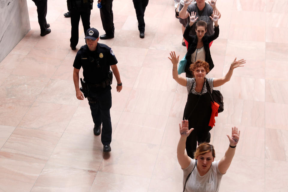 Sarandon walks to be arrested as she joined demonstrators in an anti-Trump immigration policy protest on June 28, 2018.&nbsp; (Photo: Jonathan Ernst / Reuters)